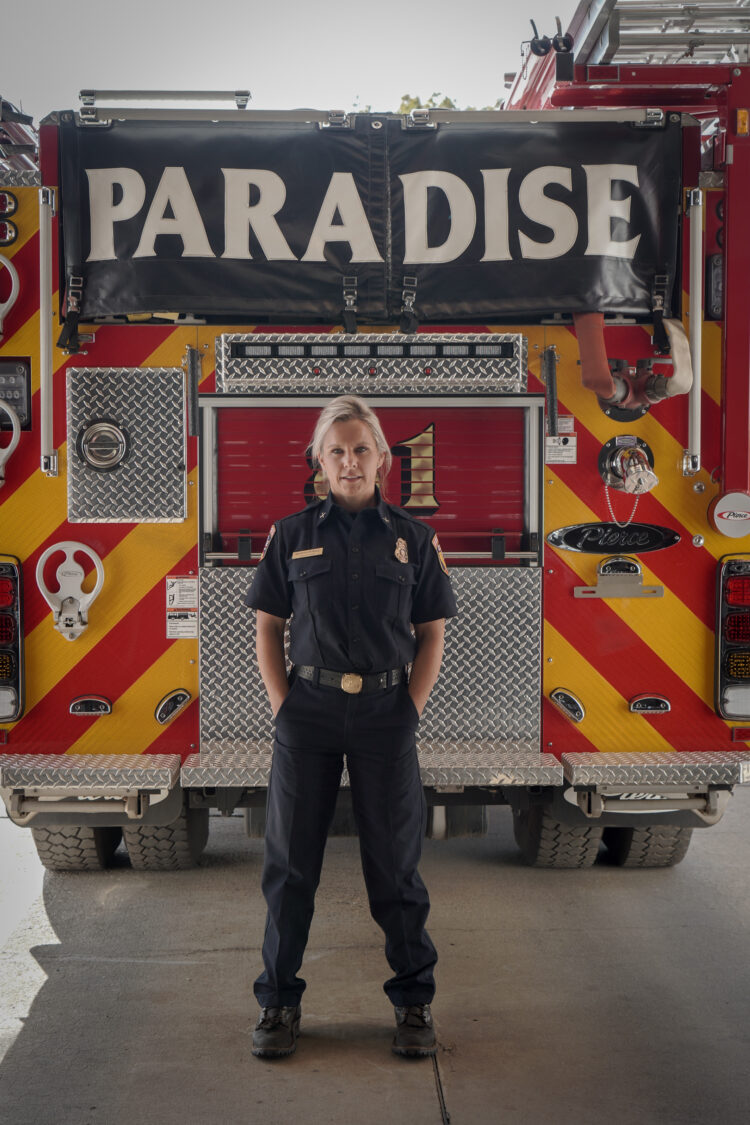 Paradise, CA - Shawna Powell, Cal Fire Northern Region Peer Support Battalion Chief, stands in front of a Paradise Fire Department fire truck. (National Geographic/Sarah Soquel Morhaim)